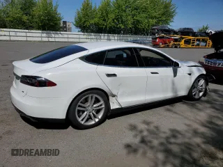 2013 Tesla Model S с VIN 5YJSA1CN3DFP05949, выставлен на аукционе Copart как лот 61244825 с пробегом 174 022 миль миль и Списание • Salvage title. История ставок и продаж доступна на DreamBid. Изображение 3.
