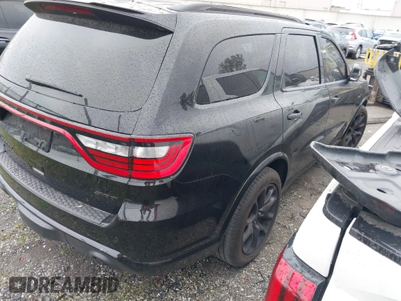 2023 Dodge Durango SRT 392 Premium with VIN 1C4SDJGJ6PC557943, listed as a IAAI auction lot 41478480 with 13,733 mi miles and . Bid and sale history available at DreamBid. Image 4.