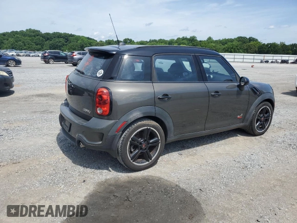 2012 MINI Countryman S with VIN WMWZC5C5XCWL56232, listed as a Copart auction lot 60298705 with 140,425 mi miles and Salvage title. Bid and sale history available at DreamBid. Image 3.
