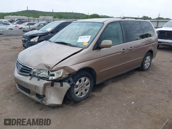 2003 Honda Odyssey EX-L z VIN 5FNRL18063B135949, wystawiony jako IAAI lot #42248105 z przebiegiem 210 567 mil mil oraz . Historia ofert i sprzedaży dostępna na DreamBid. Obrazek 18.