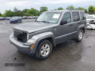 2012 Jeep Liberty Sport with VIN 1C4PJMAK2CW118636, listed as a IAAI auction lot 42646591 with 170,607 mi miles and . Bid and sale history available at DreamBid. Image 2.