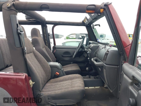 2003 Jeep Wrangler Sport with VIN 1J4FA49S63P324904, listed as a IAAI auction lot 42138001 with 170,917 mi miles and . Bid and sale history available at DreamBid. Image 5.