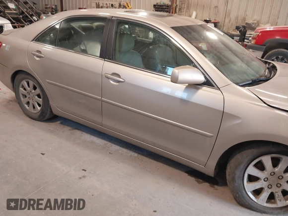 2009 Toyota Camry with VIN 4T4BE46K09R069420, listed as a IAAI auction lot 40201083 with 207,493 mi miles and . Bid and sale history available at DreamBid. Image 14.