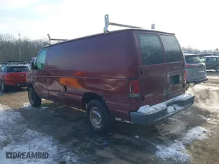 2003 Ford Econoline Cargo Van with VIN 1FTNE24243HB24311, listed as a IAAI auction lot 41404876 with NaN miles. Bid and sale history available at carsss.com. Image 3.