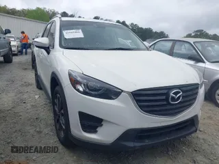 2016 Mazda CX-5 Grand Touring with VIN JM3KE2DY6G0622030, listed as a IAAI auction lot 41943466 with 110,283 mi miles. Bid and sale history available at carsss.com. Image 1.