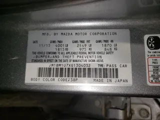 2016 Mazda 3 i Sport with VIN JM1BM1U7XG1304032, listed as a Copart auction lot 46791905 with 122,775 mi miles and Salvage Title. Bid and sale history available at carsss.com. Image 12.