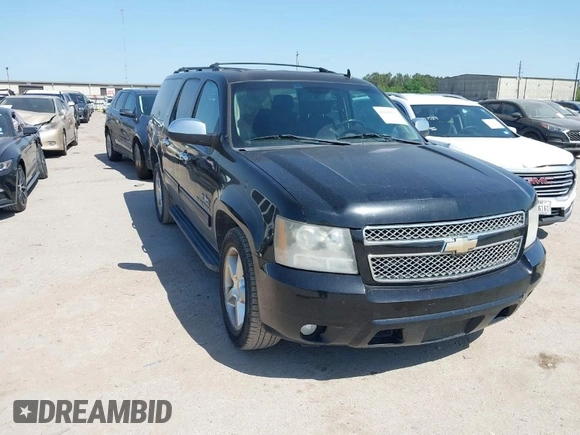 2011 Chevrolet Suburban LT with VIN 1GNSCJE09BR235355, listed as a IAAI auction lot 42030105 with 308,576 mi miles. Bid and sale history available at carsss.com. Image 1.