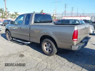 2002 Ford F-150 XL with VIN 1FTRX17232NA79508, listed as a IAAI auction lot 41870844 with 111,429 mi miles. Bid and sale history available at carsss.com. Image 3.