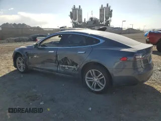 2013 Tesla Model S with VIN 5YJSA1CG9DFP09733, listed as a Copart auction lot 87739005 with 88,163 mi miles and Salvage title. Bid and sale history available at DreamBid. Image 2.