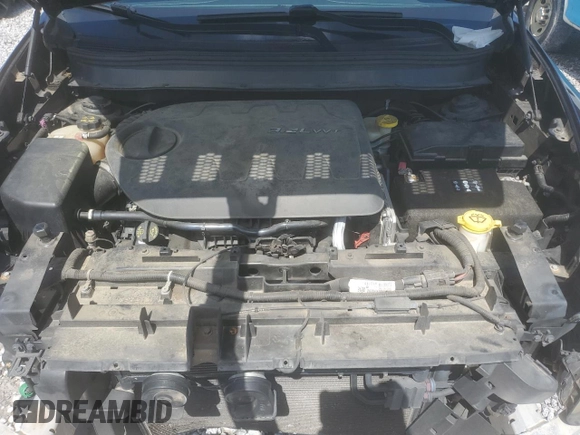 2014 Jeep Cherokee Latitude z VIN 1C4PJMCS5EW252136, wystawiony jako Copart lot #58525335 z przebiegiem 111 193 mil mil oraz Szkoda całkowita • Salvage title. Historia ofert i sprzedaży dostępna na DreamBid. Obrazek 12.