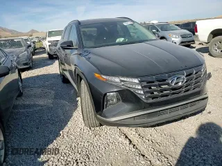 2022 Hyundai Tucson SEL with VIN 5NMJBCAE5NH030189, listed as a Copart auction lot 75327374 with 33,864 mi miles and Salvage Title. Bid and sale history available at DreamBid. Image 11.
