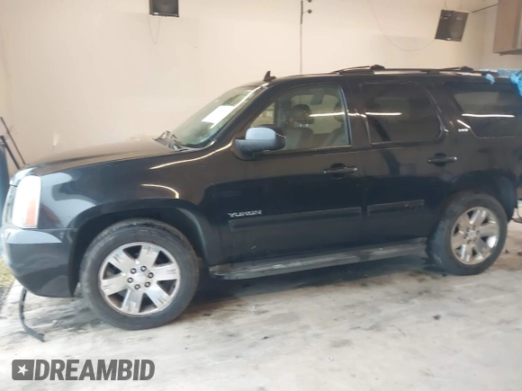 2011 GMC Yukon SLT z VIN 1GKS2CE00BR260589, wystawiony jako IAAI lot #41858005 z przebiegiem 191 594 mil mil oraz . Historia ofert i sprzedaży dostępna na DreamBid. Obrazek 14.