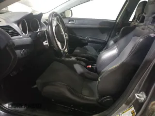 2011 Mitsubishi Lancer with VIN JA32Y6HVXBU601253, listed as a Copart auction lot 79090934 with 147,823 mi miles and Salvage Title. Bid and sale history available at DreamBid. Image 7.