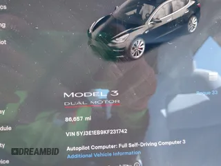 2019 Tesla Model 3 Long Range with VIN 5YJ3E1EB9KF231742, listed as a IAAI auction lot 42114608 with 86,657 mi miles and . Bid and sale history available at DreamBid. Image 7.