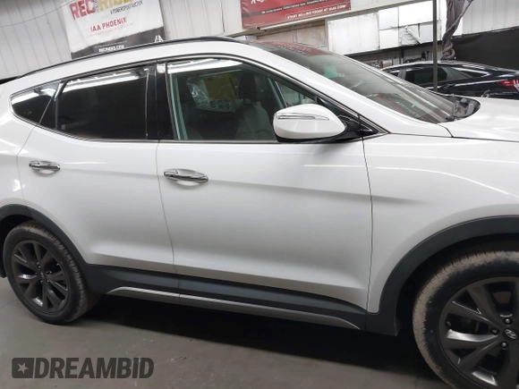 2017 Hyundai Santa Fe Ultimate with VIN 5NMZW4LA0HH040141, listed as a IAAI auction lot 42603243 with 140,817 mi miles and . Bid and sale history available at DreamBid. Image 13.