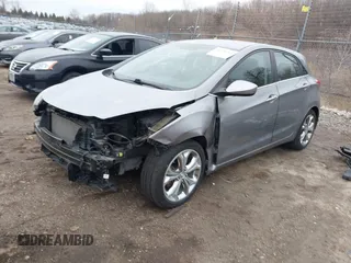 2013 Hyundai Elantra GT with VIN KMHD35LE0DU148382, listed as a IAAI auction lot 41898768 with 77,673 mi miles. Bid and sale history available at carsss.com. Image 2.