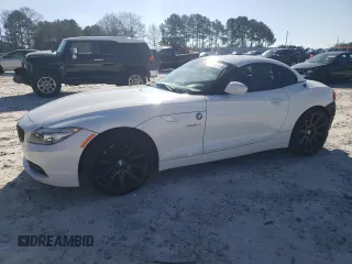 2011 BMW Z4 sDrive30i with VIN WBALM5C5XBE379064, listed as a Copart auction lot 87475414 with 105,420 mi miles and Salvage Title. Bid and sale history available at carsss.com. Image 1.