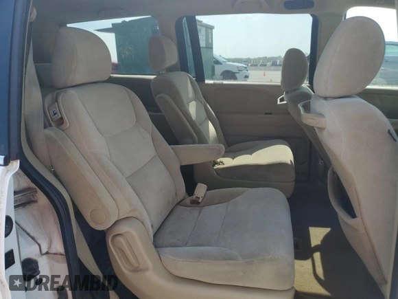 2009 Honda Odyssey LX with VIN 5FNRL38259B040742, listed as a Copart auction lot 59397975 with 161,562 mi miles and Clean title. Bid and sale history available at DreamBid. Image 11.
