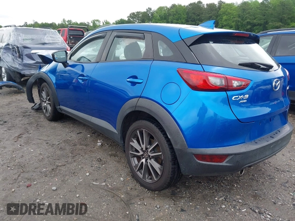 2017 Mazda CX-3 Touring z VIN JM1DKFC7XH0171860, wystawiony jako IAAI lot #42249818 z przebiegiem 54 873 mil mil oraz . Historia ofert i sprzedaży dostępna na DreamBid. Obrazek 3.