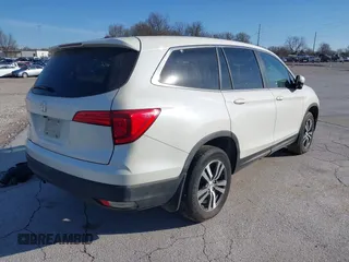 2016 Honda Pilot EX-L with VIN 5FNYF5H5XGB016152, listed as a IAAI auction lot 41820023 with 210,474 mi miles and . Bid and sale history available at DreamBid. Image 4.