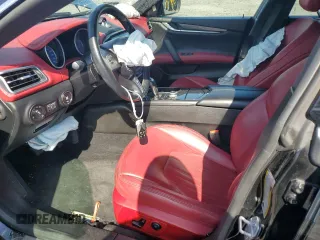 2019 Maserati Ghibli S Q4 z VIN ZAM57YTA8K1328392, wystawiony jako Copart lot #50711685 z przebiegiem 56 609 mil mil oraz Szkoda całkowita • Salvage title. Historia ofert i sprzedaży dostępna na DreamBid. Obrazek 7.