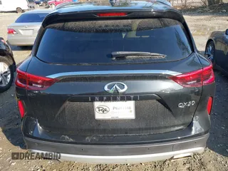 2021 Infiniti QX50 Essential with VIN 3PCAJ5CA9MF100592, listed as a IAAI auction lot 41513164 with 10,388 mi miles and . Bid and sale history available at DreamBid. Image 16.