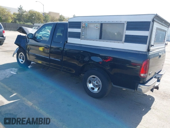 2002 Ford F-150 XL with VIN 1FTRX17L02NB79722, listed as a IAAI auction lot 41538404 with 202,050 mi miles. Bid and sale history available at carsss.com. Image 3.