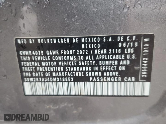 2013 Volkswagen Jetta S with VIN 3VW2K7AJ4DM318853, listed as a Copart auction lot 57597955 with 165,023 mi miles and Salvage title. Bid and sale history available at DreamBid. Image 12.
