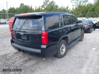 2015 Chevrolet Tahoe LT with VIN 1GNSCBKCXFR687597, listed as a IAAI auction lot 41935279 with 213,290 mi miles. Bid and sale history available at carsss.com. Image 4.