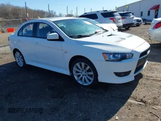 2011 Mitsubishi Lancer GTS with VIN JA32U8FW3BU030708, listed as a IAAI auction lot 41826170 with 213,889 mi miles. Bid and sale history available at carsss.com. Image 1.