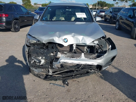 2020 BMW X1 sDrive28i with VIN WBXJG7C08L5R71214, listed as a IAAI auction lot 41514330 with 34,140 mi miles. Bid and sale history available at carsss.com. Image 6.
