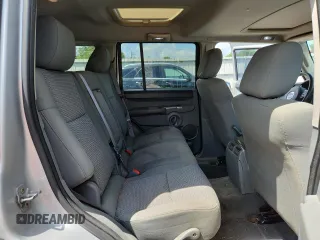 2007 Jeep Commander Sport z VIN 1J8HG48P47C691235, wystawiony jako Copart lot #64057505 z przebiegiem 135 641 mil mil oraz Szkoda całkowita • Salvage title. Historia ofert i sprzedaży dostępna na DreamBid. Obrazek 11.