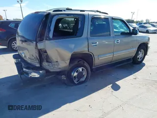 2001 Chevrolet Tahoe LS z VIN 1GNEC13T21J303213, wystawiony jako IAAI lot #41363563 z przebiegiem 194 243 mil mil oraz . Historia ofert i sprzedaży dostępna na DreamBid. Obrazek 4.