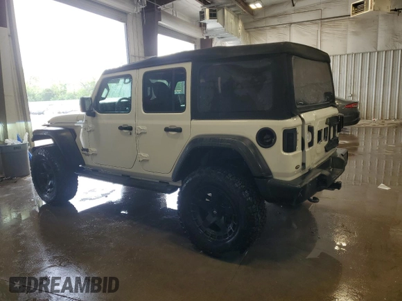 2021 Jeep Wrangler Unlimited Sport S z VIN 1C4HJXDG6MW777009, wystawiony jako Copart lot #60307665 z przebiegiem 30 634 mil mil oraz Szkoda całkowita • Salvage title. Historia ofert i sprzedaży dostępna na DreamBid. Obrazek 2.