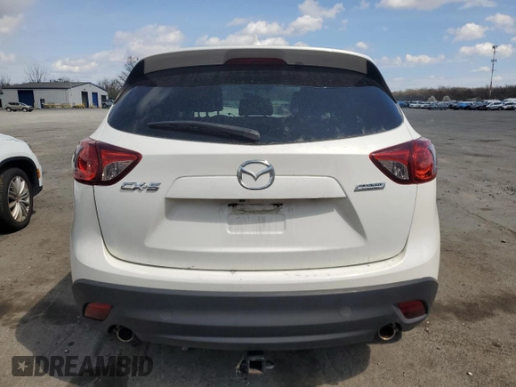 2016 Mazda CX-5 Grand Touring z VIN JM3KE2DY9G0645141, wystawiony jako Copart lot #50989635 z przebiegiem 123 898 mil mil oraz Szkoda całkowita • Salvage title. Historia ofert i sprzedaży dostępna na DreamBid. Obrazek 6.