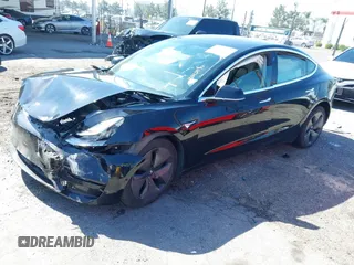 2018 Tesla Model 3 Long Range Battery with VIN 5YJ3E1EB9JF183920, listed as a IAAI auction lot 41657742 with 107,358 mi miles and . Bid and sale history available at DreamBid. Image 16.