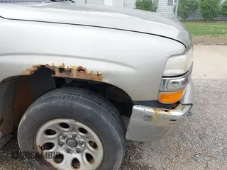 2001 Chevrolet Tahoe LT z VIN 1GNEK13T01R128643, wystawiony jako IAAI lot #42286231 z przebiegiem 186 852 mil mil oraz . Historia ofert i sprzedaży dostępna na DreamBid. Obrazek 18.