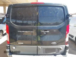 2015 Ford Transit Cargo z VIN 1FTBW2YGXFKB09311, wystawiony jako IAAI lot #41741551 z przebiegiem 314 773 mil mil oraz . Historia ofert i sprzedaży dostępna na DreamBid. Obrazek 16.