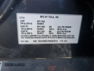2024 Tesla Model Y Long Range with VIN 7SAYGDEE7RA307013, listed as a Copart auction lot 54767595 with 12,953 mi miles and Salvage Title. Bid and sale history available at DreamBid. Image 13.
