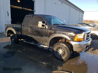 2002 Ford Super Duty F-250 XL with VIN 1FTNX21L32ED61461, listed as a Copart auction lot 79456694 with 0 mi miles and Salvage Title. Bid and sale history available at carsss.com. Image 4.