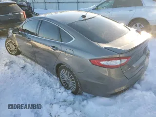 2013 Ford Fusion Titanium Hybrid with VIN 3FA6P0RU1DR367142, listed as a Copart auction lot 87252624 with 89,445 mi miles and Salvage Title. Bid and sale history available at DreamBid. Image 2.