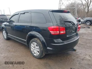 2014 Dodge Journey SE with VIN 3C4PDCAB8ET151666, listed as a IAAI auction lot 41721164 with 262,991 mi miles and . Bid and sale history available at carsss.com. Image 3.
