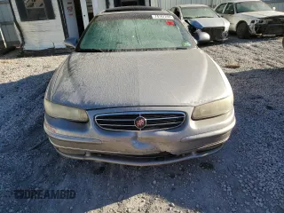 1999 Buick Regal LS with VIN 2G4WB52K8X1446410, listed as a Copart auction lot 74797294 with 0 mi miles and Salvage Title. Bid and sale history available at carsss.com. Image 5.