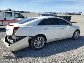 2014 Cadillac XTS Premium z VIN 2G61P5S35E9313677, wystawiony jako Copart lot #50205465 z przebiegiem 71 264 mil mil oraz Szkoda całkowita • Salvage title. Historia ofert i sprzedaży dostępna na DreamBid. Obrazek 3.