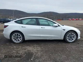 2023 Tesla Model 3 Long Range with VIN 5YJ3E1EB8PF600291, listed as a IAAI auction lot 41651156 with 37,055 mi miles and . Bid and sale history available at DreamBid. Image 12.