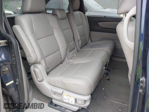 2015 Honda Odyssey EX-L z VIN 5FNRL5H68FB070392, wystawiony jako IAAI lot #42412403 z przebiegiem 146 907 mil mil oraz . Historia ofert i sprzedaży dostępna na DreamBid. Obrazek 8.