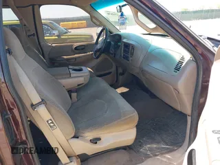 2000 Ford F-150 XL with VIN 1FTRX18L5YNA99713, listed as a IAAI auction lot 42194838 with Not provided miles and . Bid and sale history available at DreamBid. Image 5.