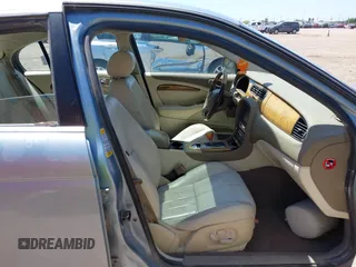 2004 Jaguar S-Type with VIN SAJEA01T94FN04630, listed as a IAAI auction lot 42033159 with 117,715 mi miles and . Bid and sale history available at DreamBid. Image 5.