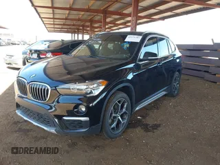 2018 BMW X1 sDrive28i z VIN WBXHU7C35J5L06673, wystawiony jako IAAI lot #42275787 z przebiegiem 61 204 mil mil oraz . Historia ofert i sprzedaży dostępna na DreamBid. Obrazek 17.