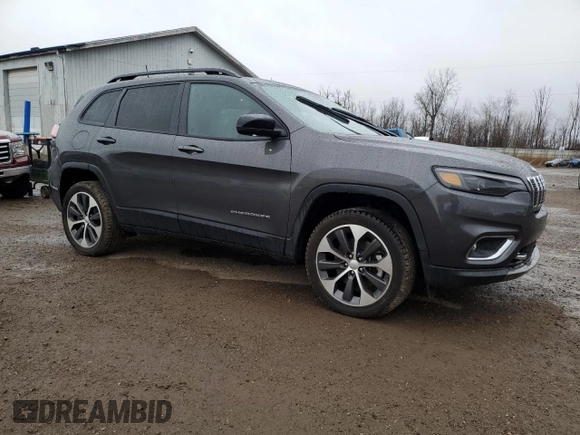 2022 Jeep Cherokee Limited with VIN 1C4PJMDX4ND548898, listed as a Copart auction lot 49797095 with 12,338 mi miles and Clean Title. Bid and sale history available at DreamBid. Image 4.